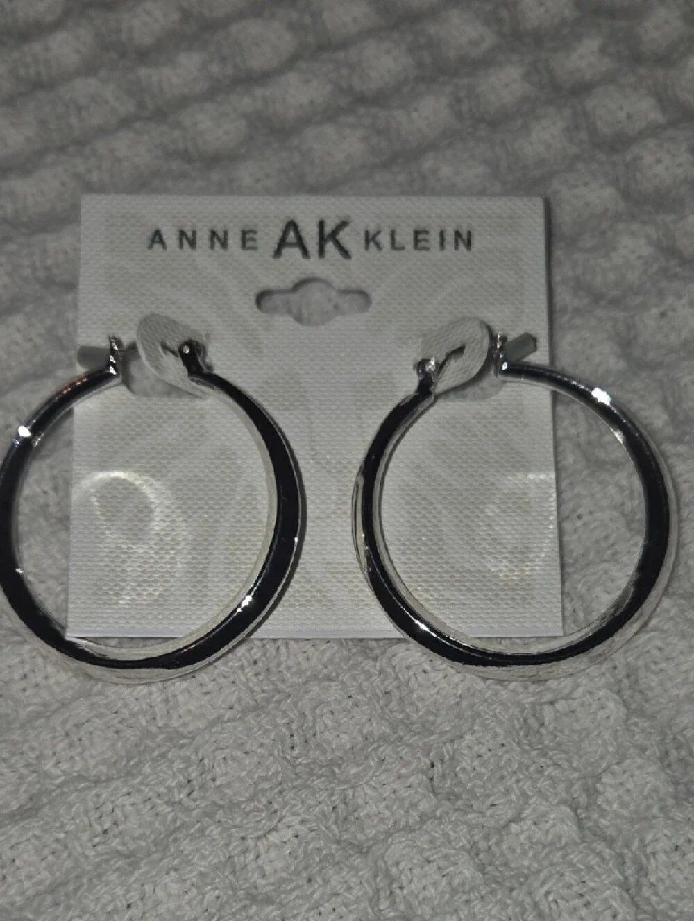 Anne Klein Shiny Silver Rounded Hoop Earrings